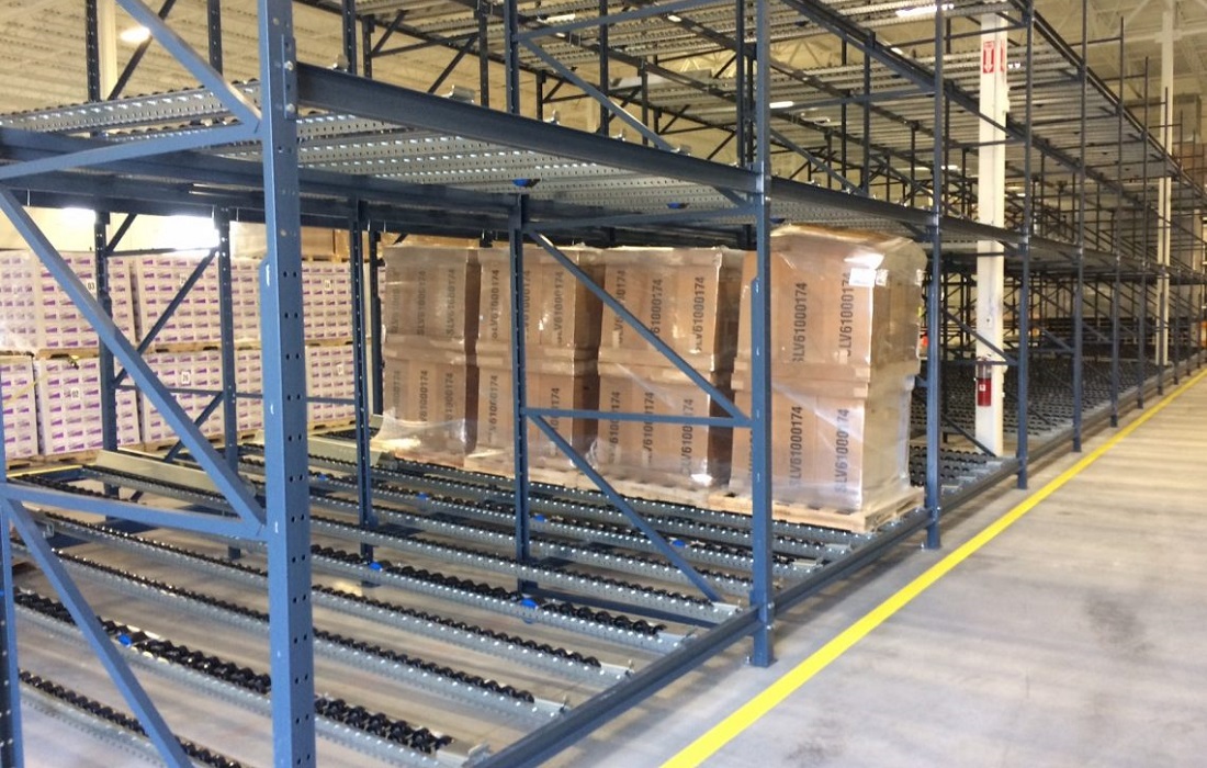 Pallet flow rack lanes with gravity rollers installed